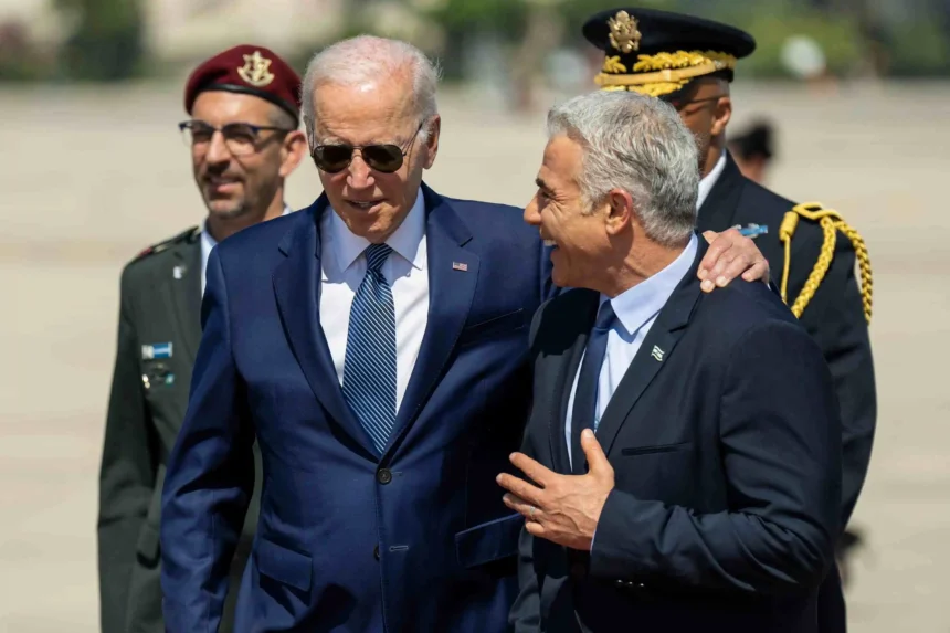 President Joe Biden greets Israeli Prime Minister Yair Lapid at an arrival ceremony, Wednesday, July 13, 2022, at Ben Gurion Airport in Tel Aviv, Israel. Official White House Photo by Adam Schultz.