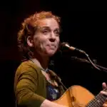 American singer-songwriter, guitarist, and activist Ani DiFranco performing at the Etown Concert, where she focused on a selection of political songs, demonstrating her unique blend of musical artistry and social commentary.