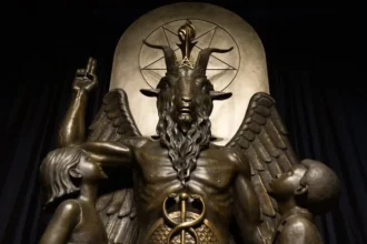 Statue of Baphomet with children, a symbol used in modern Satanism and political activism, representing duality and knowledge.