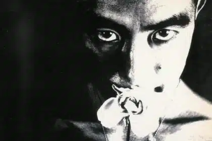 Capture the essence of Yukio Mishima, an emblem of Homoerotic Nationalism, as he intricately weaves together sexuality and patriotism in his literary and political pursuits.