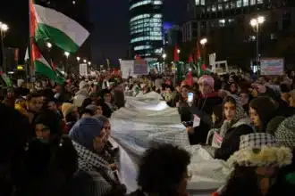 The protesters unroll a list with the names of the more than 12,000 civilians, including 6,150 children and 5,000 women, who have been killed by the Israeli military in Gaza since October 7, 2023. This is a protest against Sacred violence.