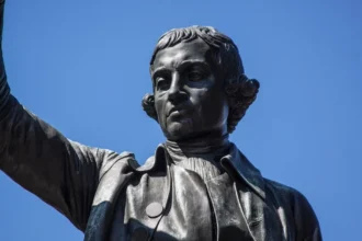 Statue of Edmund Burke, a prominent Counter-Revolutionary thinker of the 18th century, known for his critique of revolutionary rationalism and his defense of European traditions.