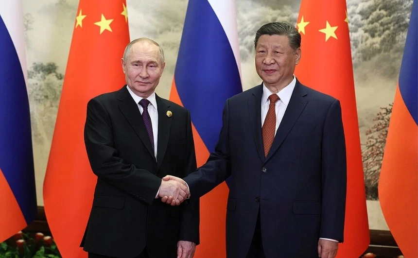 President of Russia Vladimir Putin and General Secretary of the Chinese Communist Party Xi Jinping, solidifying a strategic alliance that challenges the established norms of global geopolitics, during a state visit in the Great Hall of the People in Beijing.