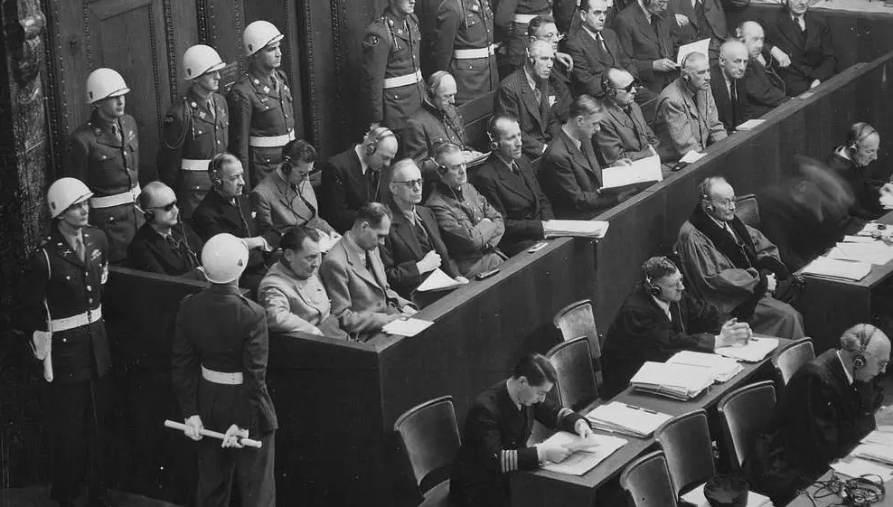Perpetrators-This historic image captures a pivotal moment in the aftermath of World War II, where key figures accused of war crimes were brought to justice during the Nuremberg Trials. Held between 1945 and 1946, the trials marked a defining step toward accountability for atrocities committed, setting a precedent for international law and justice.