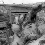 A stark glimpse into the trenches of World War I, epitomizing the brutal realities of conflict. This image underscores the enduring 'causes of war'—territorial disputes, political rivalries, and the human propensity for domination.