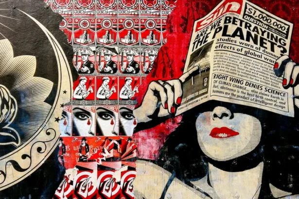 A political street mural in San Diego with bold red, black, and beige tones. It features a woman holding a newspaper questioning climate denial, propaganda-style posters, and imagery related to surveillance and control. The artwork highlights free speech, censorship, and political power dynamics.