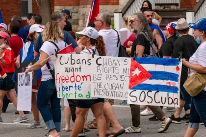 In this photo, Cuban exiles and supporters march through downtown Ottawa, Canada, protesting the Cuban government's repression of the historic July 2021 demonstrations. The protest denounced mass arrests, censorship, and especially the nationwide internet shutdowns used by Cuban authorities to silence dissent and prevent the spread of images and information.