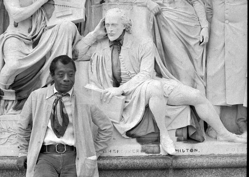 James Baldwin, whose work explored how Jewish immigrants were absorbed into white middle-class America while Black communities remained marginalized, stands before the monuments of a cultural tradition from which he was excluded yet against which he powerfully wrote.