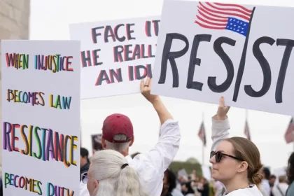 Protesters rally against voter ID laws in Washington, D.C., warning that documentation requirements—like those proposed in the SAVE Act—threaten voting rights. Photo by Victoria Pickering (CC BY-NC-ND)