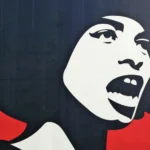 Abolition : Artwork by Shepard Fairey. A powerful visual of Black resistance and radical truth-telling, challenging the structures of obedience through unapologetic presence and voice.