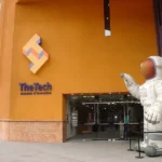 Entrance of The Tech Museum of Innovation in San José, California, featuring its iconic astronaut figure welcoming visitors. Photo by Elizabeth B. Thomsen (CC BY).
