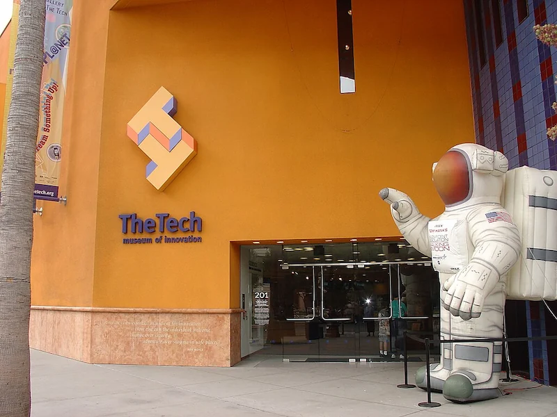 Entrance of The Tech Museum of Innovation in San José, California, featuring its iconic astronaut figure welcoming visitors. Photo by Elizabeth B. Thomsen (CC BY).