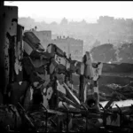 sacred violence: Ruins in Gaza after heavy bombardment as military AI reshapes the Israel–Palestine conflict. Photo by Zoriah (CC BY-NC).