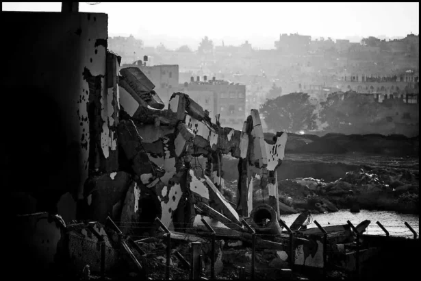 sacred violence: Ruins in Gaza after heavy bombardment as military AI reshapes the Israel–Palestine conflict. Photo by Zoriah (CC BY-NC).