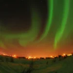 Selective aurora borealis over Yellowknife, Northwest Territories. In the Canadian North, everyday life unfolds beneath a landscape that is also at the center of debates on sovereignty, Indigenous rights, and Arctic geopolitics.