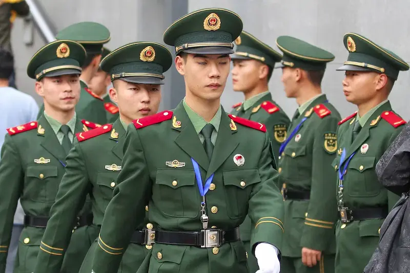 Chinese military personnel in formation, reflecting the growing role of disciplined ground forces within shifting regional power alignments (public domain).