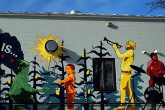 eclaration_Community mural highlighting care, culture, and shared responsibility, created as part of a local public art initiative.