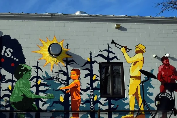 eclaration_Community mural highlighting care, culture, and shared responsibility, created as part of a local public art initiative.