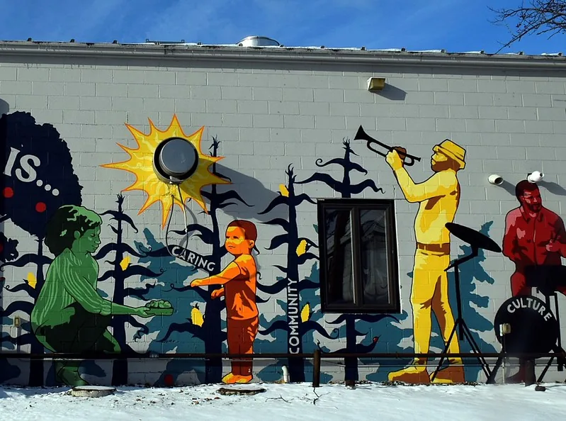 eclaration_Community mural highlighting care, culture, and shared responsibility, created as part of a local public art initiative.