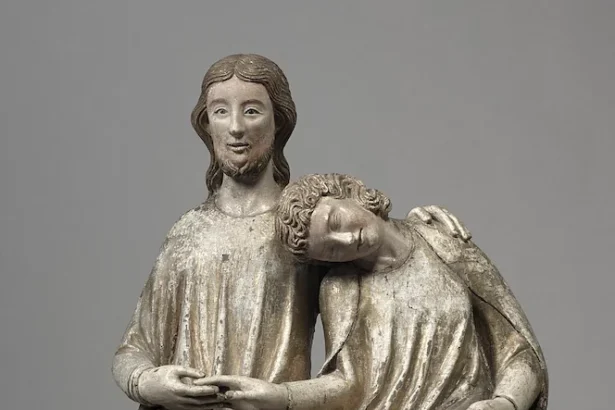 Queer_Christ and Saint John the Evangelist, Swabia, Germany, ca. 1300–1320. Cleveland Museum of Art (Public Domain). Karl Whittington reads the carving of the two figures' clasped hands as a trace of the sculptor's own touch.