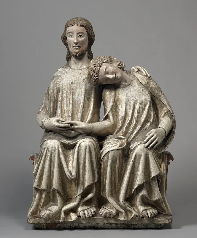 Queer_Christ and Saint John the Evangelist, Swabia, Germany, ca. 1300–1320. Cleveland Museum of Art (Public Domain). Karl Whittington reads the carving of the two figures' clasped hands as a trace of the sculptor's own touch.
