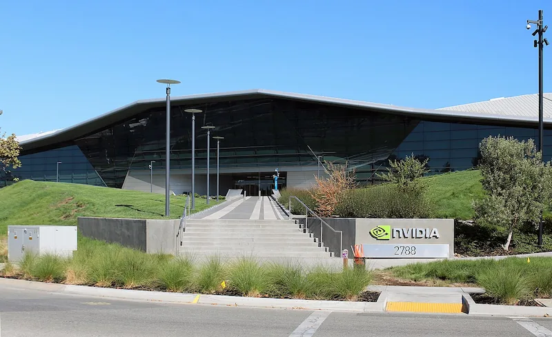 Nvidia's headquarters in Santa Clara, California. The company's chips power most of the world's leading AI models, yet its own production depends entirely on a single Taiwanese manufacturer. Photo by Coolcaesar (CC BY-SA)