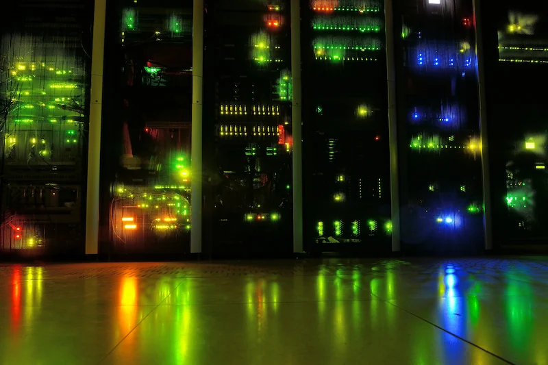 Server racks inside a data center, the physical infrastructure at the center of the growing AI backlash.
